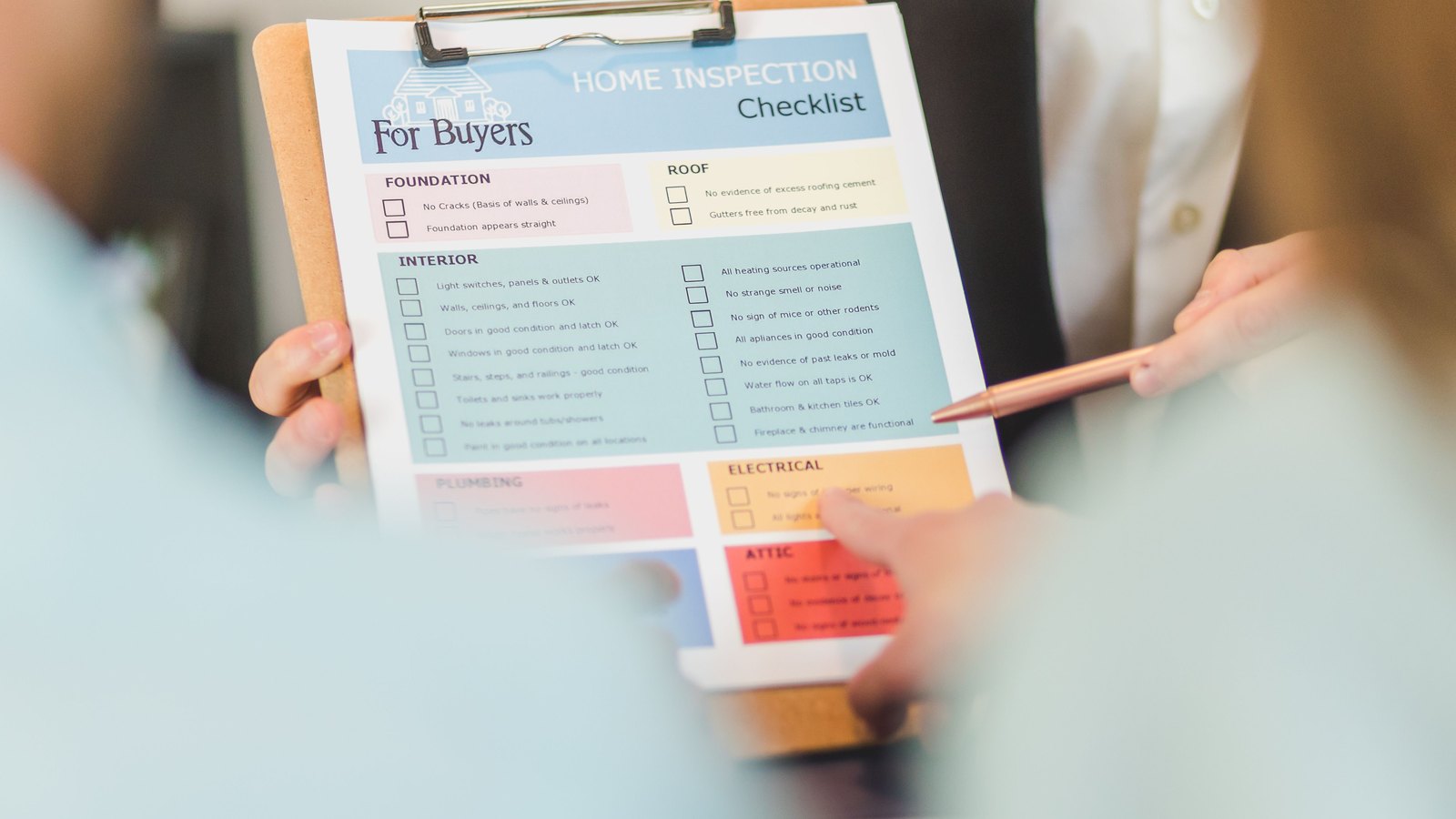 Homebuyer using a final walkthrough checklist before settlement on a Calvert County Maryland home