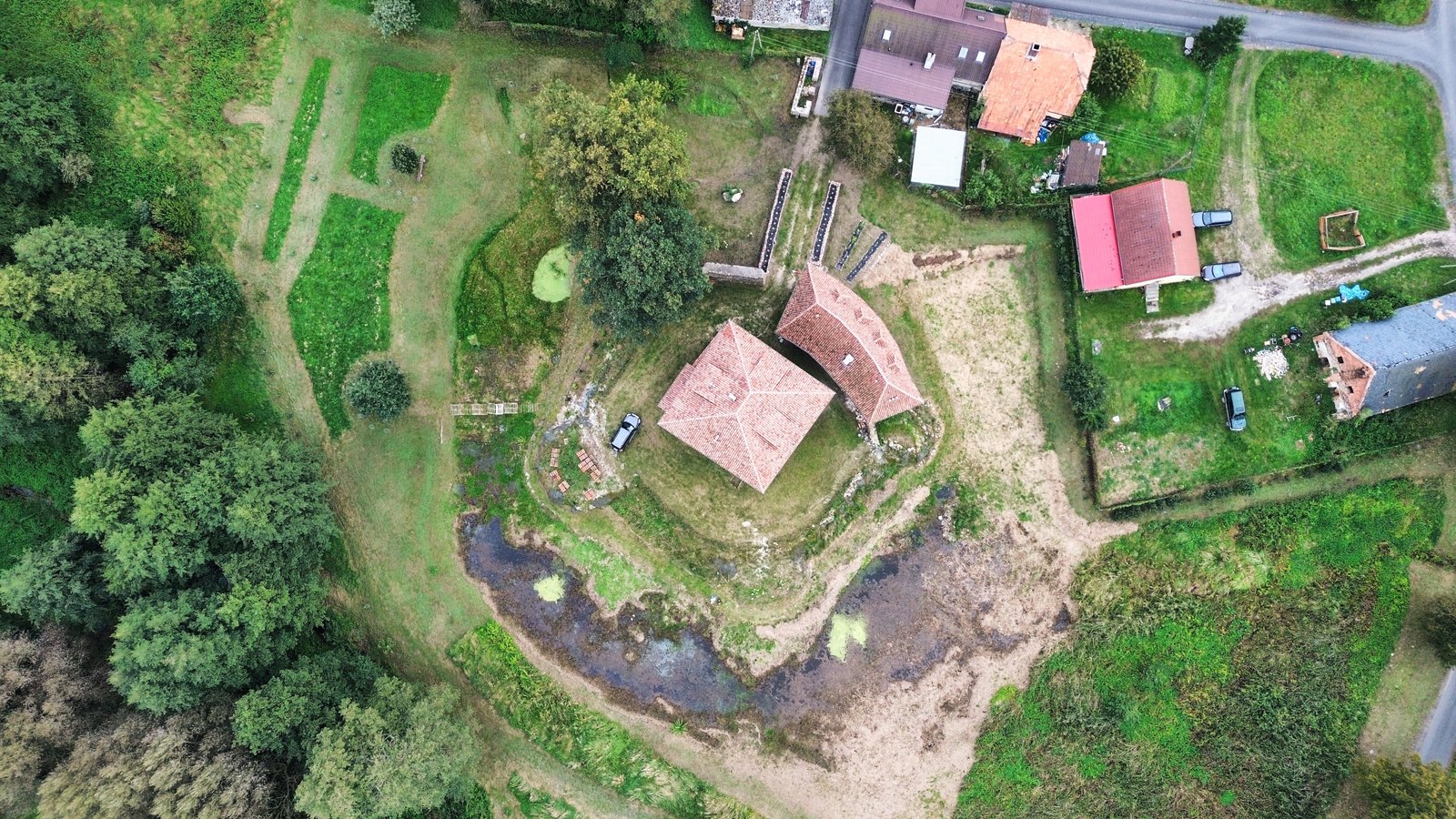 Aerial view of a unique rural home and acreage used for Calvert County pricing analysis