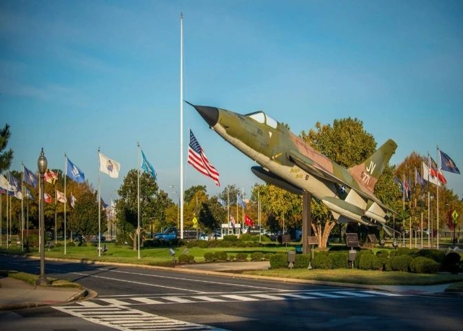 Base entrance with flags flying, representing Joint Base Anacostia-Bolling in Washington DC